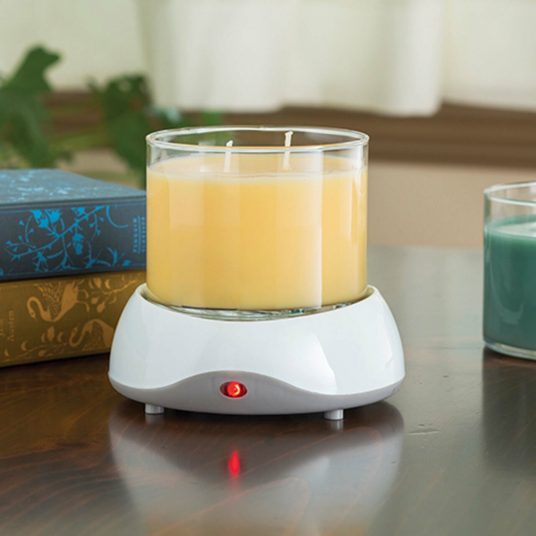 Original Warmer with Auto Shut‑Off in use on desk with jar candle