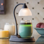 Side view of Black Signature Aurora Lamp showing elegant curved stem and shade